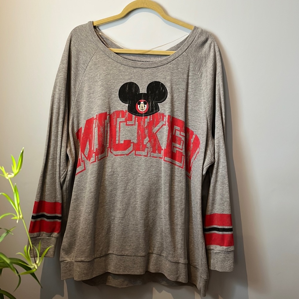 Disney parks sweatshirt with Mickey Mouse.